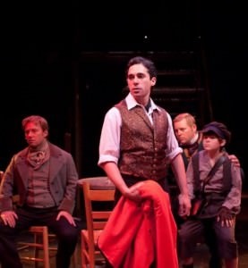 Marius (Jeffrey Shankle), Enjolras (Ben Lurye), Grantaire (Chris Harris), and Gavroche (Jace Franco) at the ABC Cafe. Photo by Kirstine Christiansen.