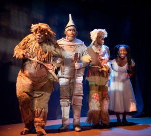 Lion (Tobias Young) Tinman (Marquise White) Scarecrow (Bryan Daniels) and Dorothy (Ashley Johnson) in 'The Wiz' at Toby's Dinner Theatre of Baltimore. Photo by Kirstine Christiansen.