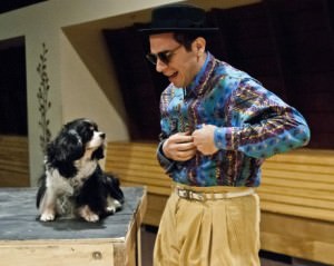 Jose Guzman (Launce) with his dog companion Crab (played by a 12-year old King Charles Spaniel named Norton) in 'Two Gentlemen of Verona.' Photo by Teresa Castracane.