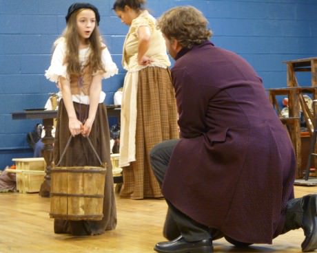 Valjean (Michael Reid) meets Little Cosette (Ella Schnoor). Photo by Diane Schnoor.