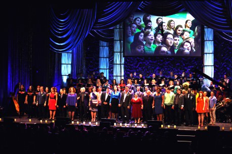 The Finale with the Cast and Sandy Hook Elementary School students (on video screen). Photo by Grace Rainer Long.