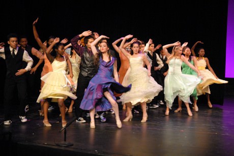 Anita (Francesca Rowe) leads the Sharks in 'The Mambo' at the dance at the gym. Photo by Lauren Scott.