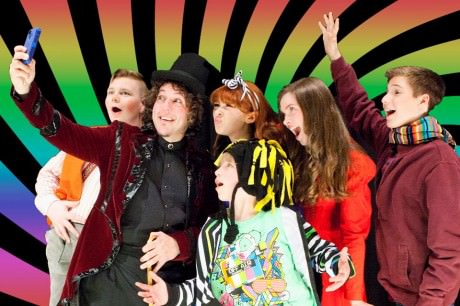 Willy Wonka (Tom Sweitzer) and cast members. Photo courtesy of Main Street Theater Productions.